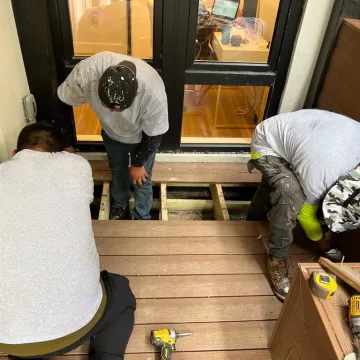 professional from the brooklyn roofer decking over a roof and floor